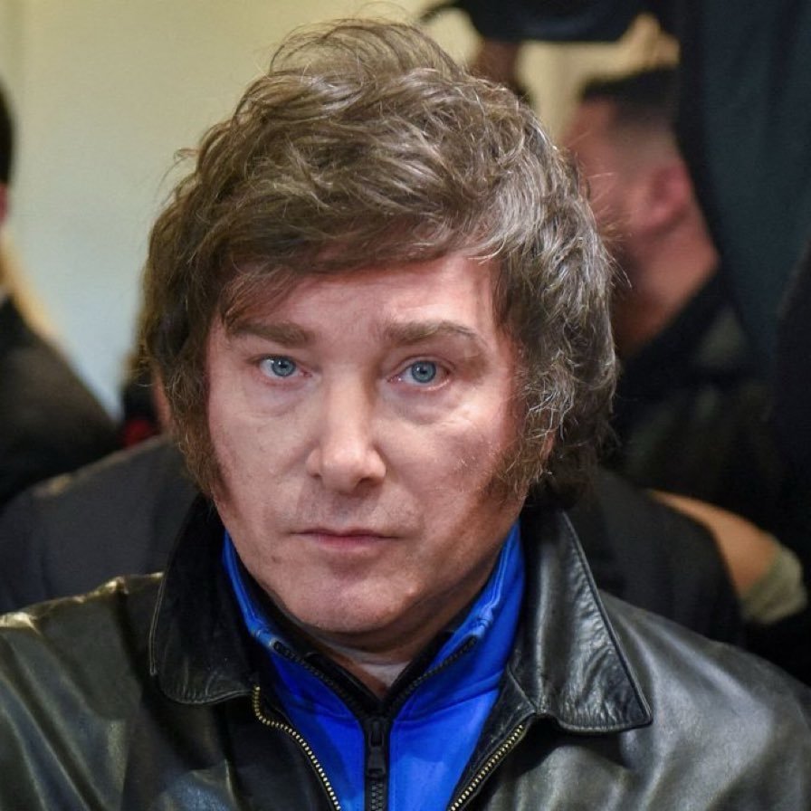 The President of Argentina looks like he signed for Bolton as their new centre half in 1972.