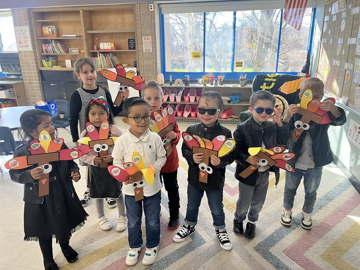 MissOBrienENL's tweet photo. Our letter T turkeys on the 50th day of school! Next stop, sock hop!!😎 https://t.co/bXaXHRhwXk