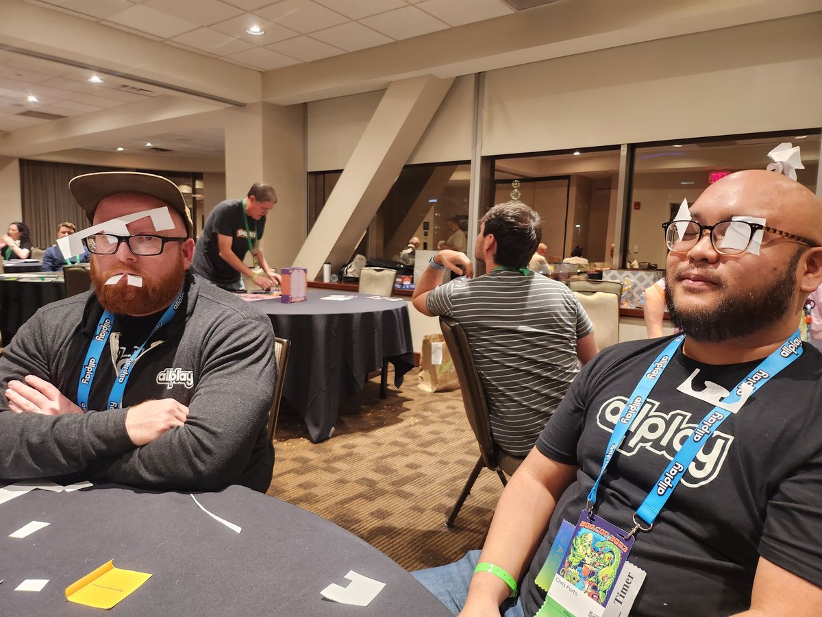 Some photo highlights of BGGcon... Sitting on the Pitch Frenzy Panel (in which designers speed pitch to other designers, who gone feedback), @rikkitahta's impression of a riding horse (and separately a camel), getting publishers I was pitching to to create disguises in 90 seconds