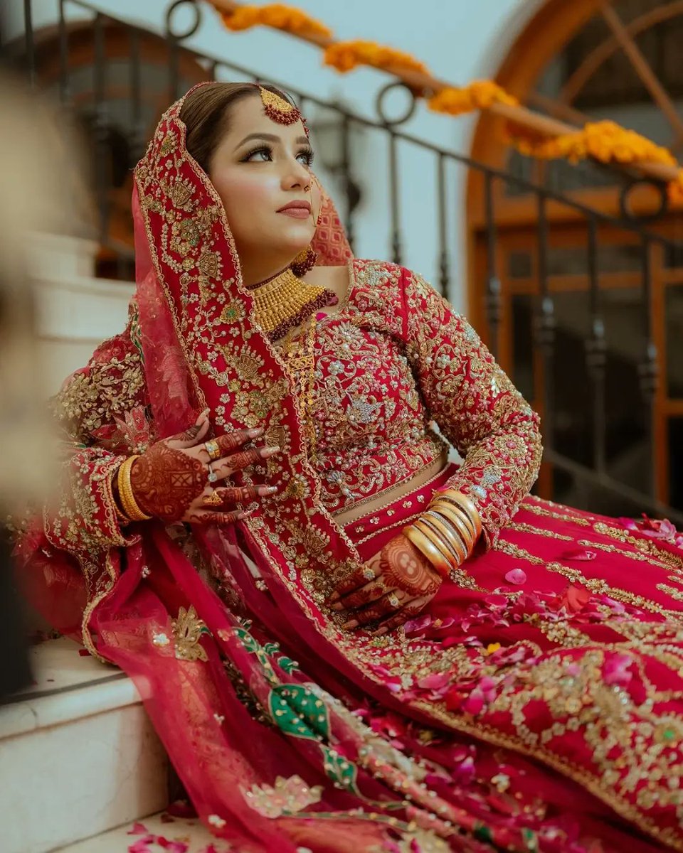 Zainab and Noroze radiate pure joy and warmth as they celebrate their special day! 🌟

Zainab graces the occasion adorned in the exquisite REBEL—a pure raw silk lehnga intricately hand-rendered and elevated with the artistry of katori sitara, pearls, dabka, and gota work.