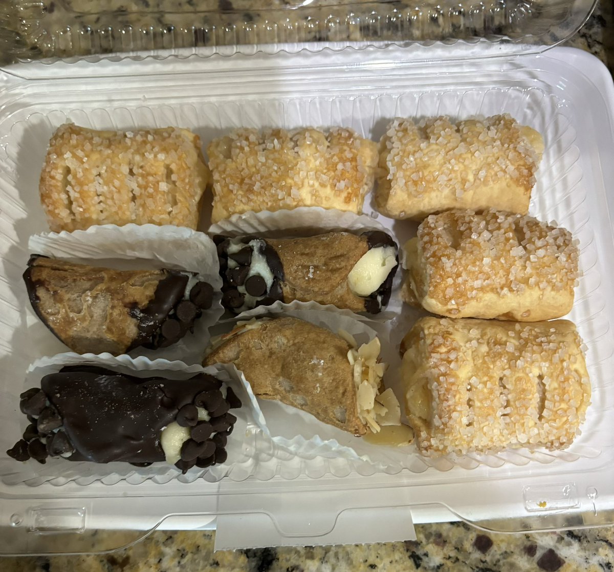 In my kitchen this am I find #quesitos in co habilitation with #canolis. Who would do such a thing. Which one would you eat? @GovGoneWild #PuertoRican #Italiano