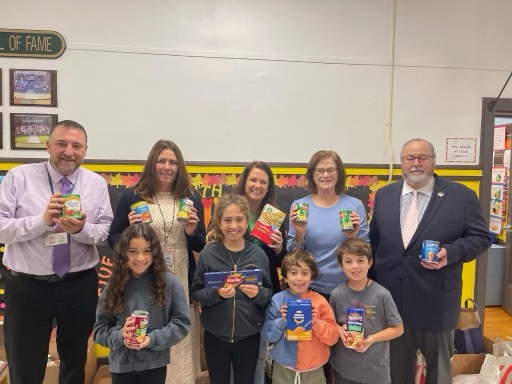 VillageRVC's tweet photo. Mayor Francis X. Murray stopped by Francis F. Wilson Elementary School on Friday for their Food Drive.  Our youngest residents know how to take a bite out of hunger! #AroundRVC https://t.co/dEz5pMC05e