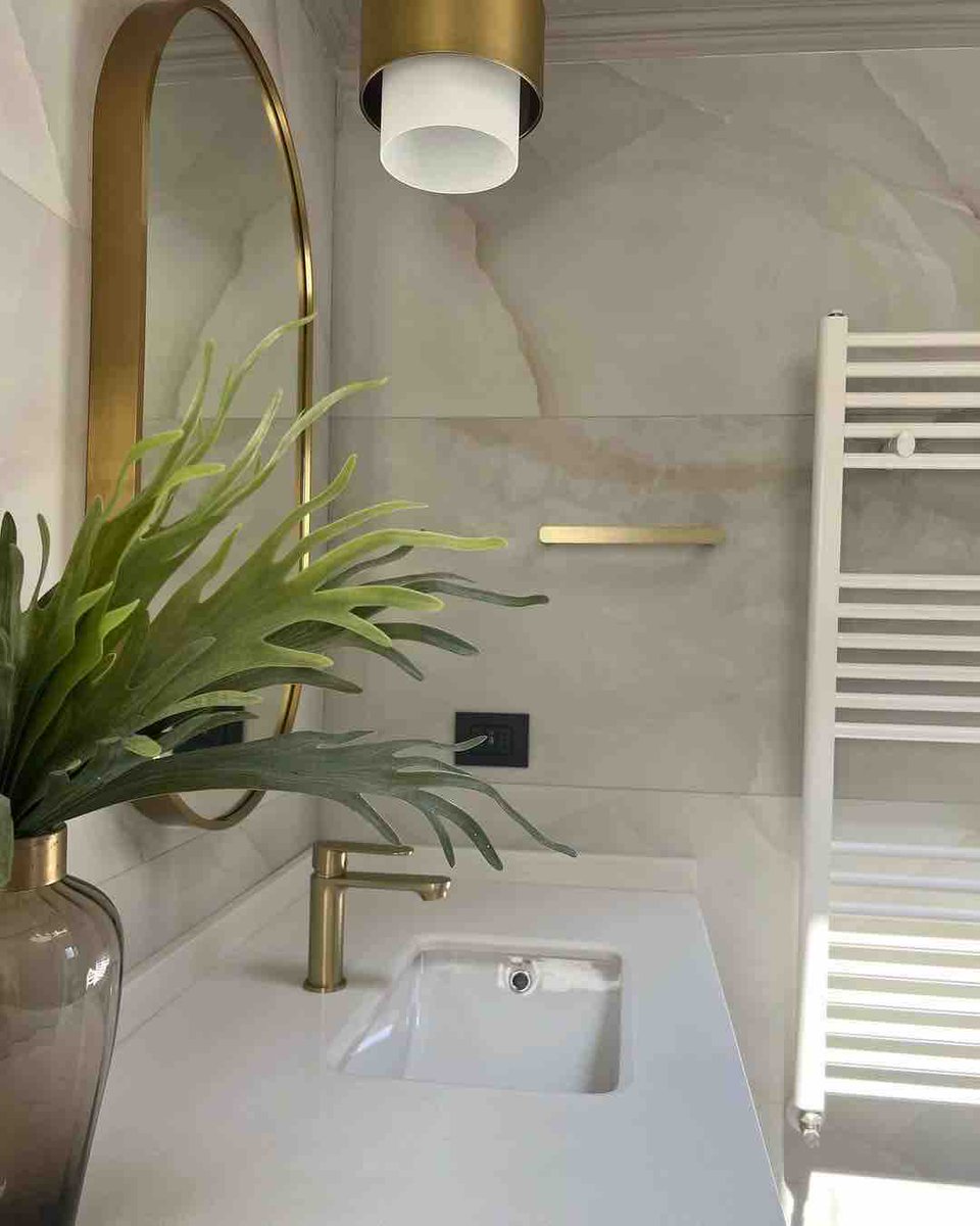 ProBuiltBuilder's tweet image. Elevate your daily rituals with opulent charm. Twin sinks adorned in gold accents, framed by lush greenery—an oasis of sophistication. #bathroomremodel #inspopicture