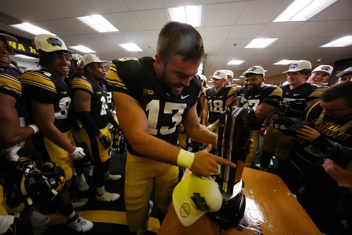 This is what leadership looks like. In their biggest moment of the year @HawkeyeFootball gathered around the West Championship trophy but nobody picked it up. They waited for their senior leader Joe Evans (a former walk on). It’s the little moments inside of the big ones.