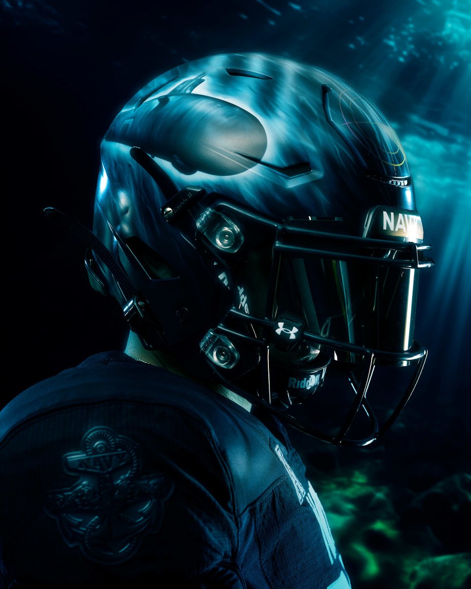 NavalInstitute's tweet photo. Navy Athletics has unveiled its sub-themed "Silent Service" football uniform for the Army-Navy Game being played on Dec. 9. The uniform's color is Elipse Navy, and the helmet features an image of a Virginia-class submarine. A jersey patch will honor USS Massachusetts (SSN 798). https://t.co/1wUbNnJa7e