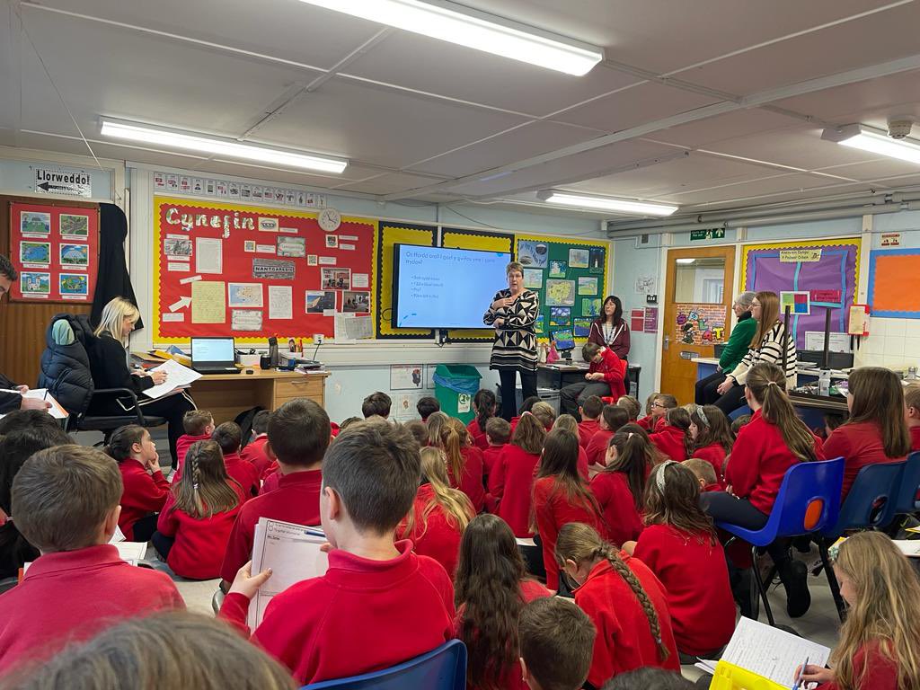 YsgolNant's tweet photo. KS2 enjoyed a very informative morning as we listened to the views of two local people, who kindly came to deliver their views on the local Pylons proposal.  
We now look forward to hearing different views on this project as we continue with our  theme. #troiallifo https://t.co/VvqjDJ8nCz