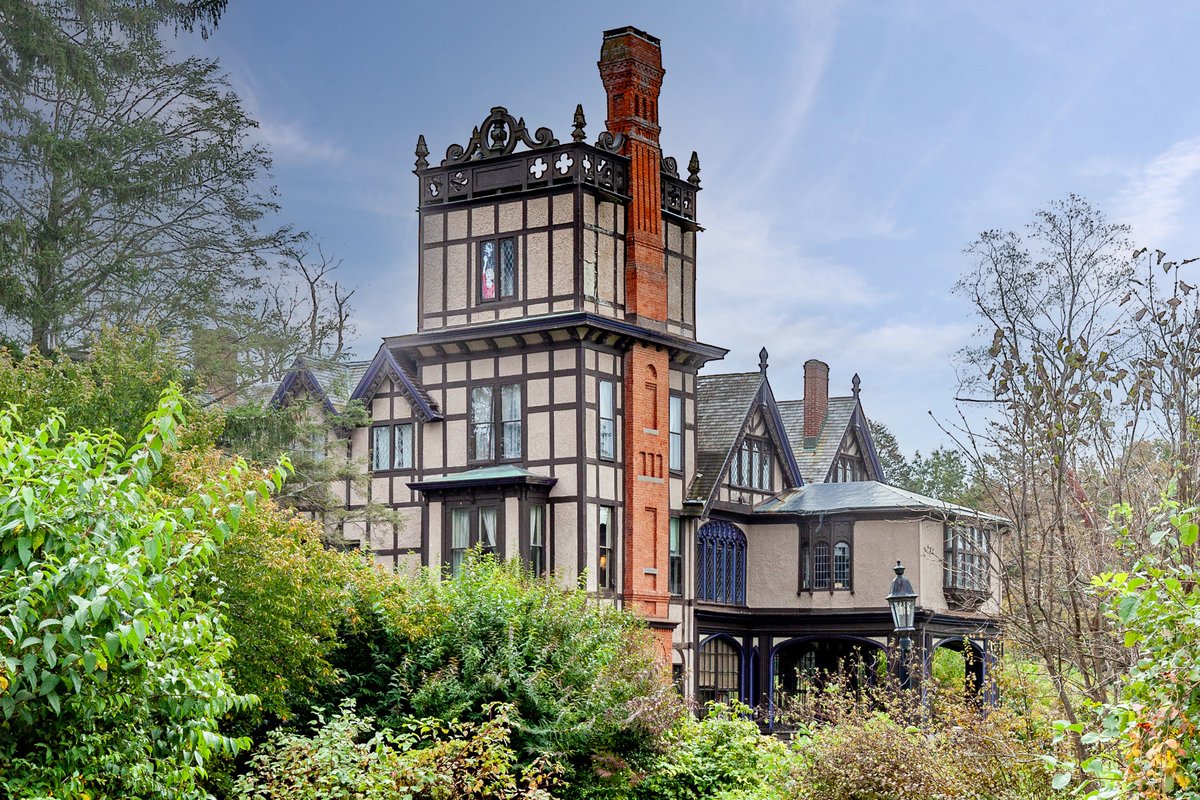 Here’s an 1860 43-room Elizabethan style manor in Pawling, NY on 25.5 acres that per the listing comes with “two caretaker homes, a carriage house with groom's quarters, a yoga studio, a 12,000 sq. ft. stable, greenhouse and more”

Actually I can’t describe this as good as the