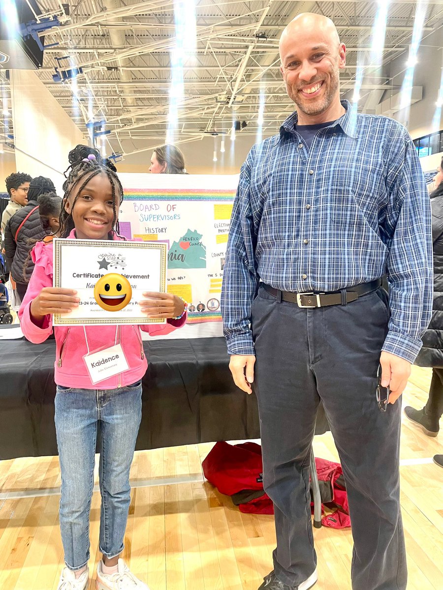 ArthurAsheJrES's tweet photo. We are very proud of Kaidence! 

She represented our school today at the Henrico History Project Awards. Her project on the History of the Henrico Board of Supervisors was selected from all 5th grade projects to represent AAES! Great job! (Pictured with her proud teacher) https://t.co/p2r8zGG61L