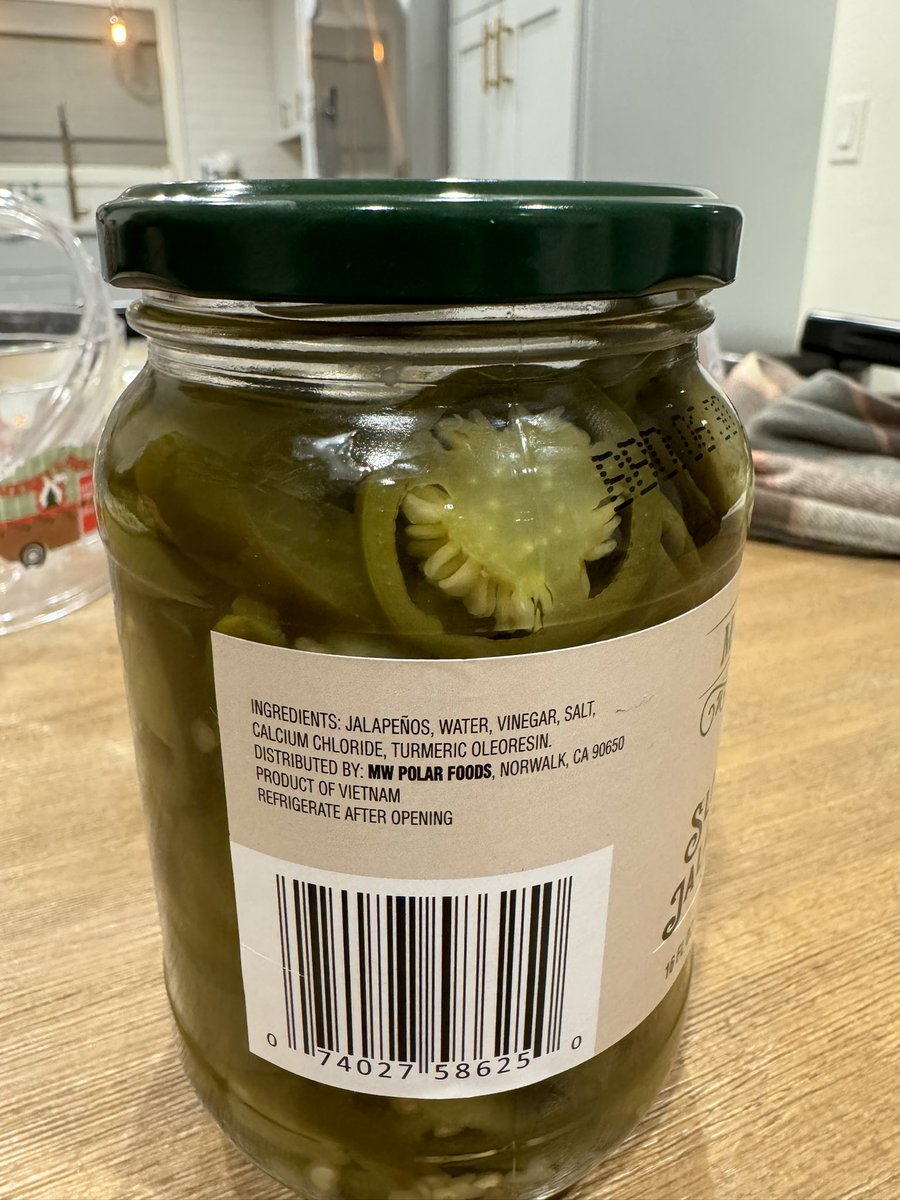 Pickled jalapeños from Vietnam with Hispanic branding for $1.79 🧐