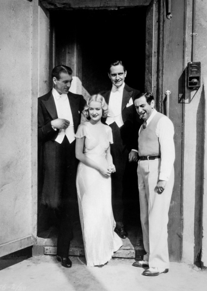 Gary Cooper, Miriam Hopkins, Fredric March, and Ernst Lubitsch on the set of Design for Living (1933)