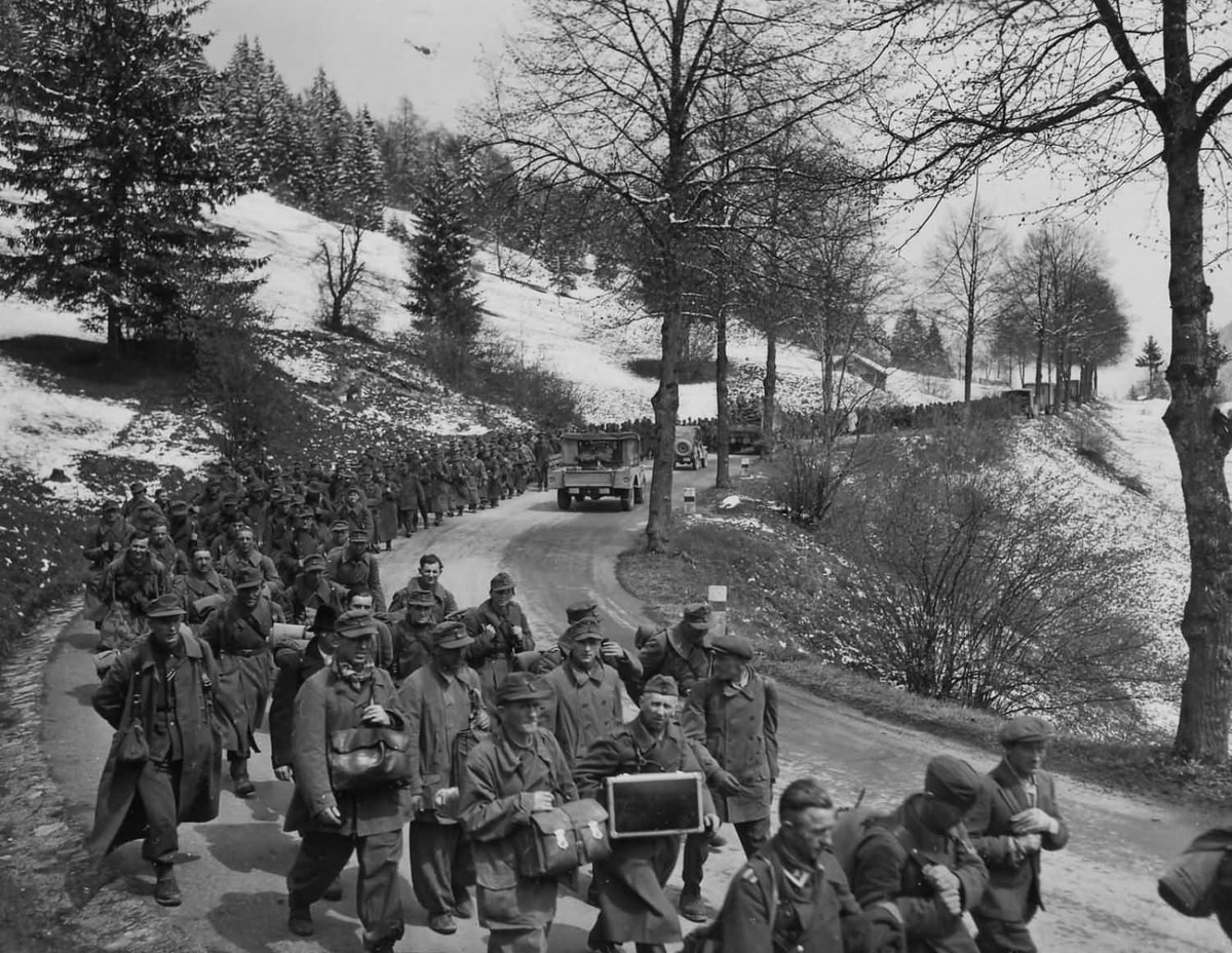 warpedia2's tweet photo. 103rd Infantry Division with Captured German Soldiers Auland Austria May 1945 #WWII #History https://t.co/tkluuFFJOf