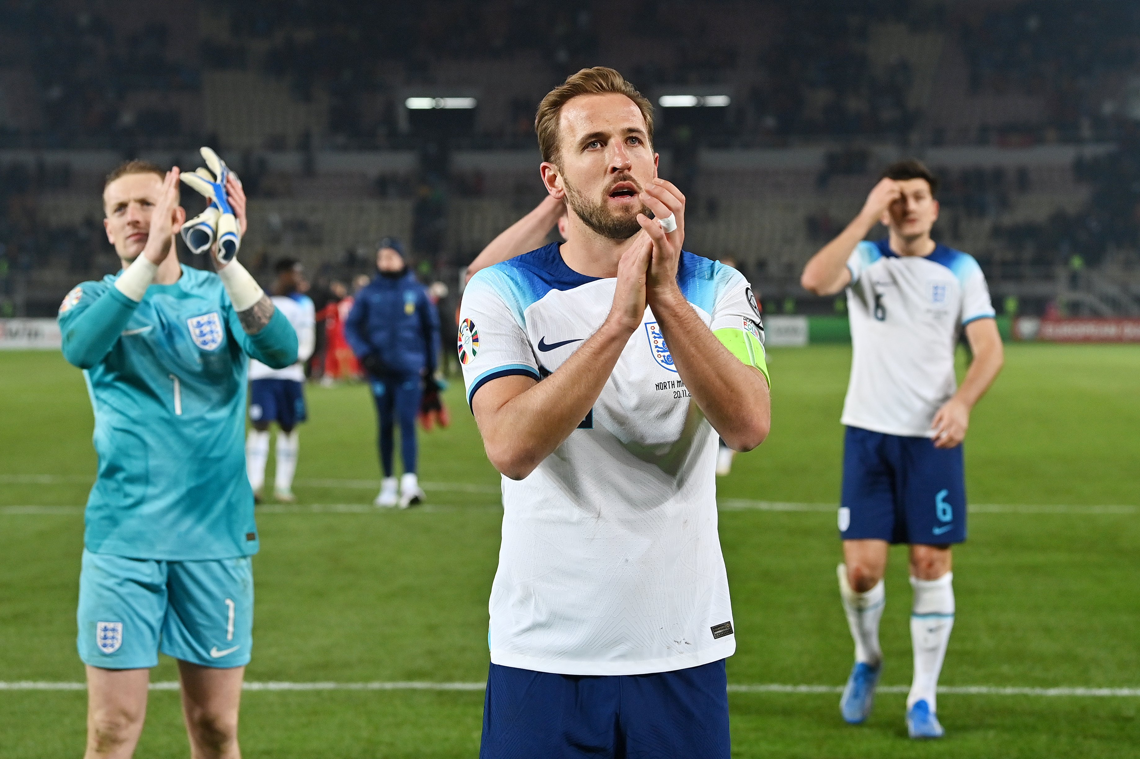 Harry Kane applauds the travelling England fans