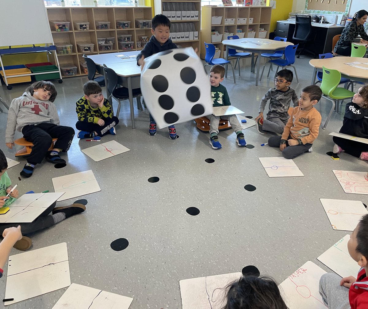 mrsbowesteaches's tweet photo. We had a blast playing with our JUMBO dice today. We took turns rolling the dice, subitizing the number and printing it on our whiteboards. Then students had to write down the number that comes before, and the number that comes after. #numbers #subitize #printing #beforeandafter https://t.co/DDK068oyXW
