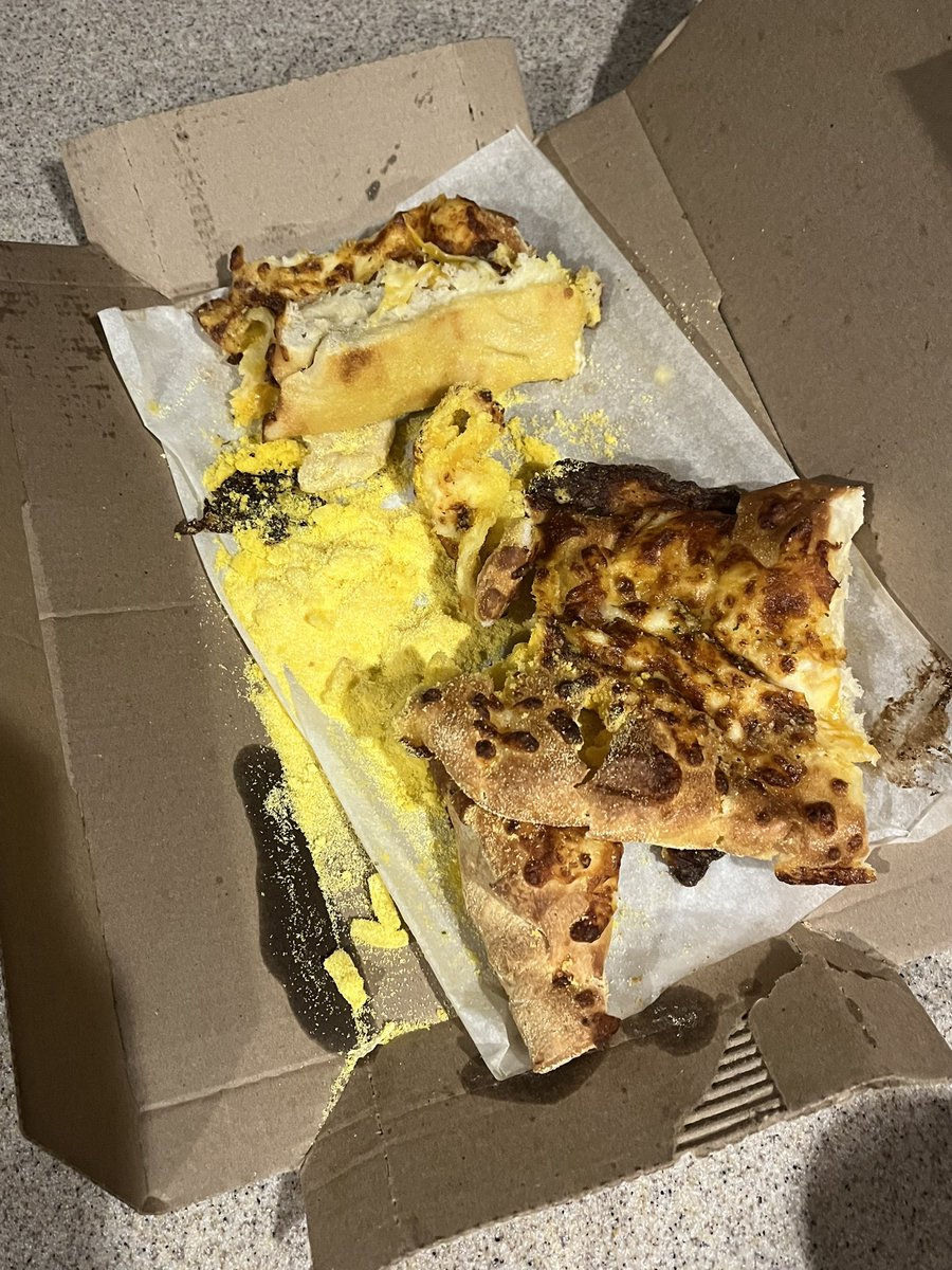 kylestyle777's tweet photo. @dominos opened up my cheesy bread tonight to find this? Feels like melted styrofoam and no idea what this yellow dust is all inside it https://t.co/kjEqGUuZWb