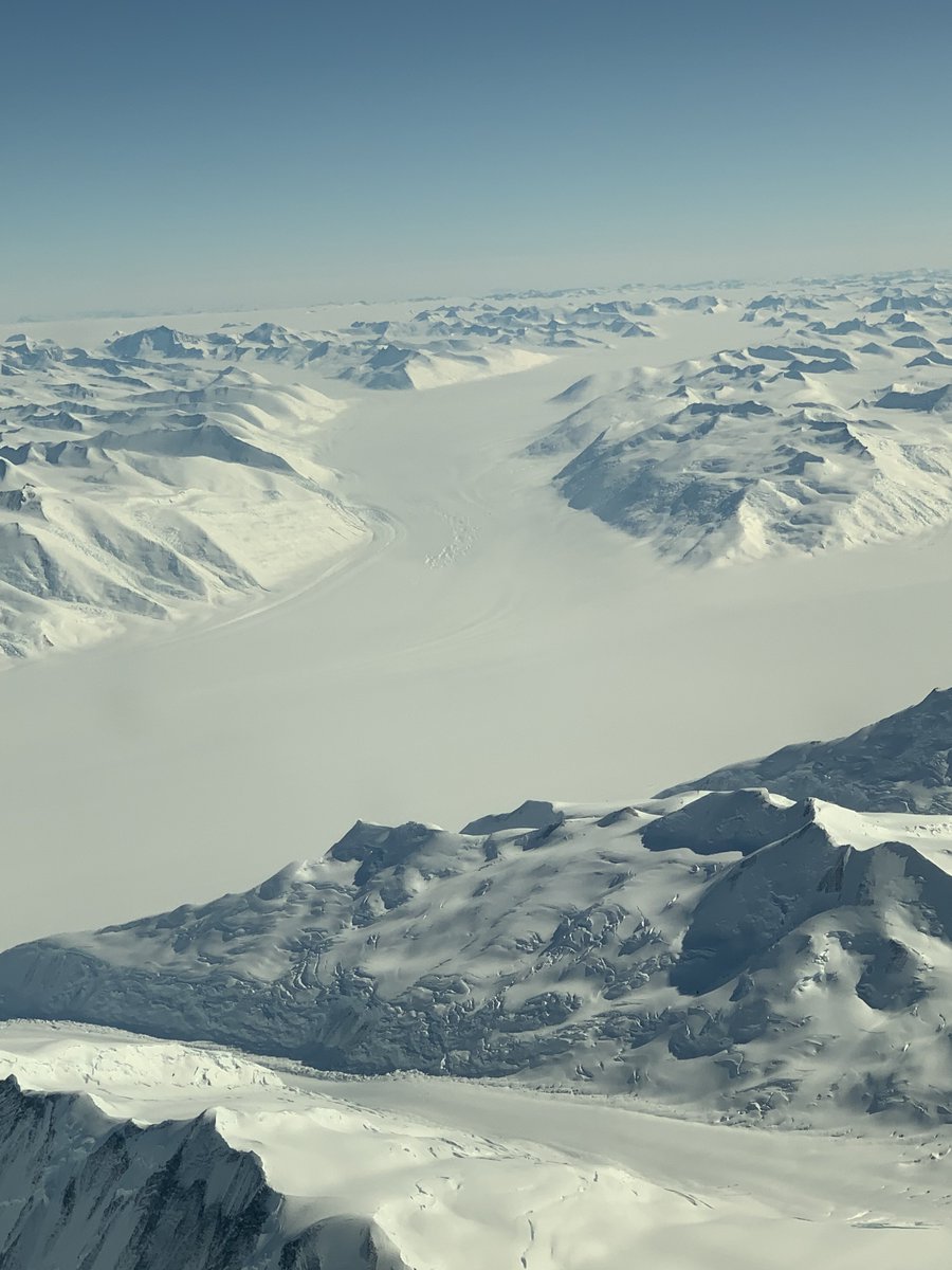 Microclimate_'s tweet photo. A landscape that appears still, but is very much in motion. 

A network of #glaciers dissect the #Transantarctic mountains near #CapeAdare 

Ice shuffles down mountains to form large #crevasse fields

The central glacier shown here is over 25km wide! https://t.co/pNTgSloZSC