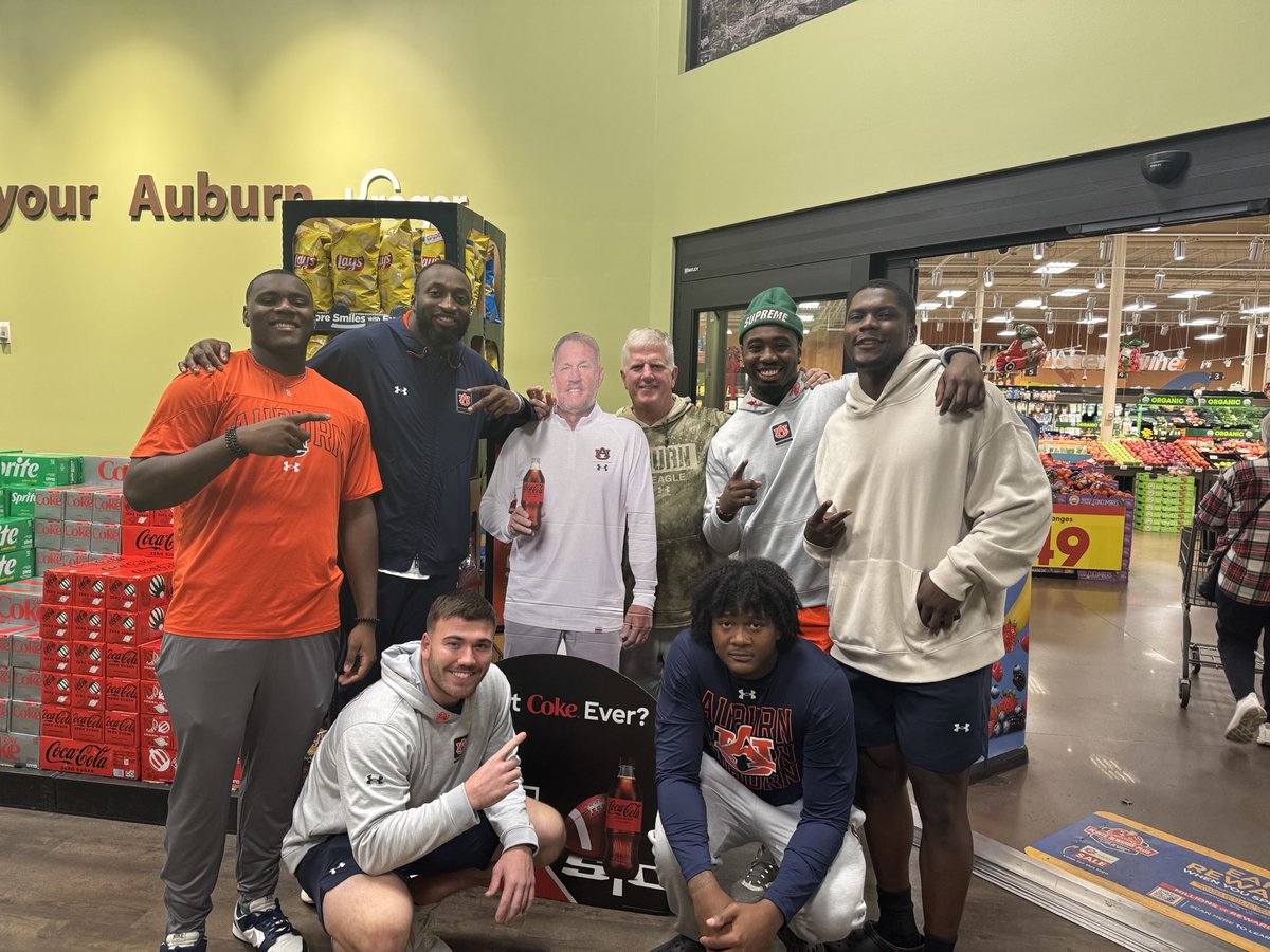 RaganF_Reynolds's tweet photo. Some of our guys out with their teammates and position coaches to bless others this Thanksgiving. Full of gratitude!!!! We are blessed!!! #WarEagle https://t.co/w5KpNWZieB
