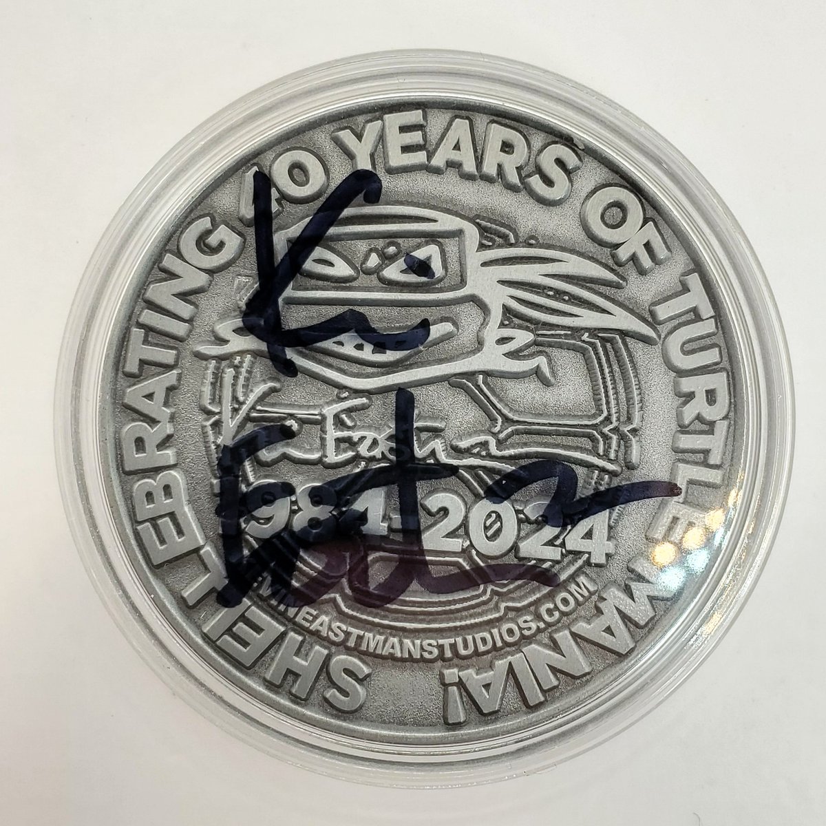The TMNT 40th anniversary commemorative coin, signed by Kevin Eastman.

#TMNT #kevineastman