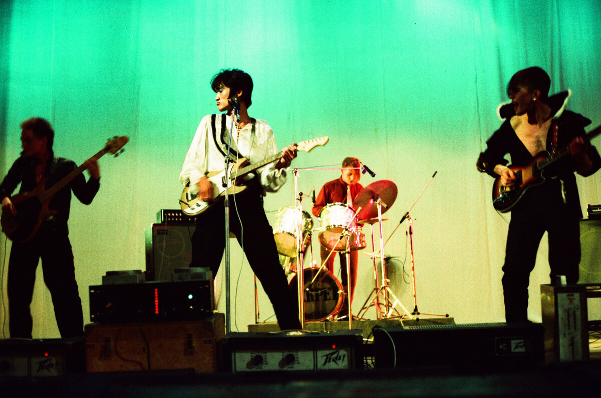 Soviet rock band "Kino" performing at the Palace of Culture during the 2nd Leningrad Rock Club festival, 1984