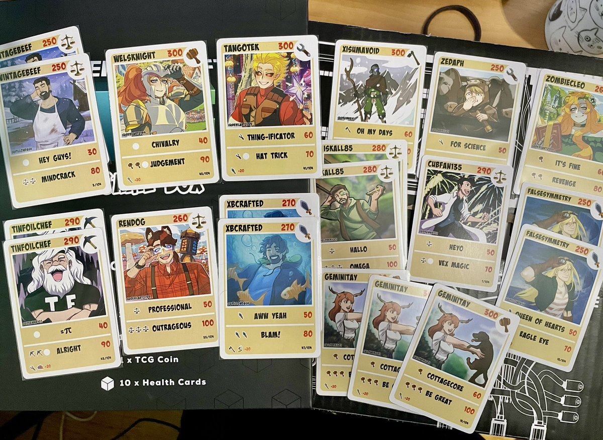 my hermitcraft tcg cards came in the mail yesterday and i had a bloody awesome time opening them on call with my mates
<a href="/creocards/">CREO</a> <a href="/VintageBeefLP/">VintageBeef</a> thank you so much for making this possible!!

sliding off the lid only to find a SIGNED <a href="/WorldofKeralis/">Keralis</a> card was seriously incredible