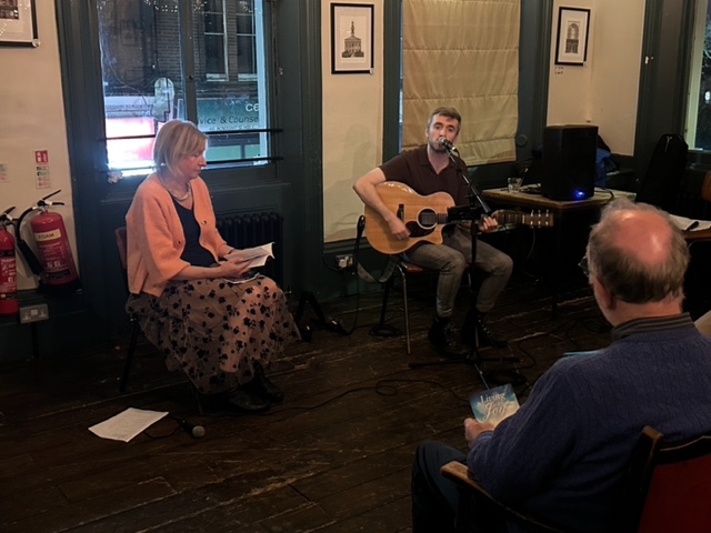 PoetryCLP's tweet photo. Poetry &amp; #folkmusic are a magical combination! Big thanks to @colinandrewmus for playing his fantastic Irish folk guitar songs at my #poetry event. We got a good crowd &amp; all seemed to enjoy it! Colin is headlining at @thefinpub on 23 Nov. Another chance to see this talented guy! https://t.co/8Jlp3yNzmL