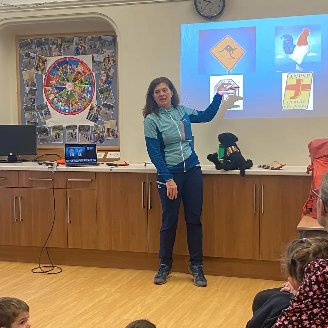 Caroline Elliot from <a href="/fjordsar/">FjordSAR CIC</a> and her rescue dog Källa, visited the school to tell us all about how to keep safe in the mountains and on the ski slopes and the role of a rescue dog.  She also kindly gifted the school a copy of her book, Fjord's Mountain Mission!