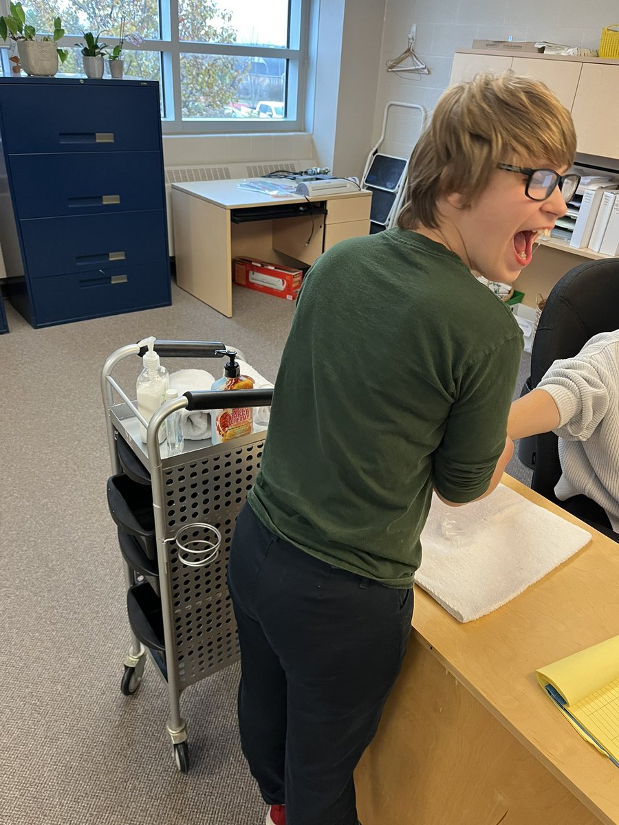 HolyCrossPTBO's tweet photo. As we continue to celebrate Safe and Caring Schools Week, one of our amazing students used their skills she has learned in Cosmetology class to give Ms. Young a hand massage. @PVNCCDSB #PVNCinspires https://t.co/KLJVgv86Ry