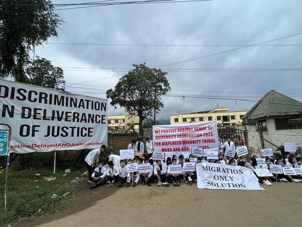 AriesHaoneoKuki's tweet photo. Over 50 MBBS students from Shija, RIMS, JNIMS are denied from their educational rights.
Today, i.e., 21st November 2023,
they are in protest against denial of exams by the University.
They are deprived of education & such discrimination against tribals shouldn't be overlooked. 

Where is Article 21A for the Kuki_Zo community? Where is our educational rights? Why are medical students deprived of their examination because we belong to the minority group? Where is humanity? For God Sake think for the future of these students🙏 

#Kuki_Zo brethren have every right to fulfill their dreams and be promising doctors! 
Please Keep the political whataboutery away from the education section and listen to their cries and provide the best solution that can be acceptable to all.
7 months is far too long 

Will the govt. pay no heed to the cries of our #Kuki_Zo medical students?
Our #Kuki_Zo brethren have every right and reasons to be heard as much as the students in Imphal valley who have been given the privilege to go ahead with their studies and appear their exams!

#Kuki_Zo 
#SeparateAdministration4Kuki_Zo 
#KukiZoStudents
#MeiteiAtrocities