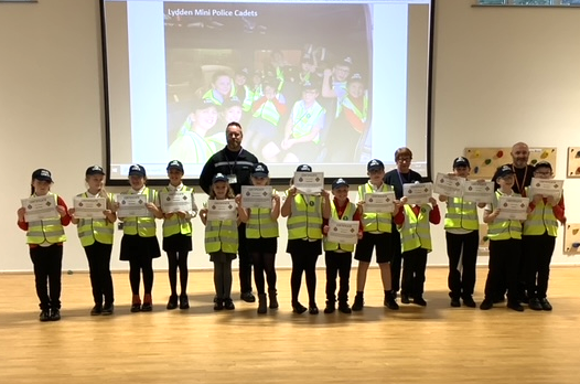 KentPoliceDover's tweet photo. Children from Lydden Primary School attended their #MiniPoliceCadets Award Ceremony last week. Officer Mark Ball facilitated the programme, guiding Cadets through 8 weeks of various Police based subjects. We are very proud of their accomplishments @NationalVPC 
@KentVPC https://t.co/ZuFy3t8Ndo
