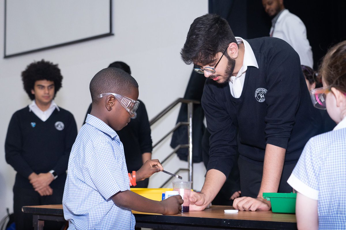 BSAKAbuDhabi's tweet photo. "This year's Science Week concluded with Primary Science Shows led by Zoya, Lora, and a dedicated team of Year 12 Science Ambassadors. They delighted the audience with awe-inspiring experiments, leaving the Primary children spellbound. #BSAKScience #BSAKSixthForm https://t.co/ylRmNnQ6Th