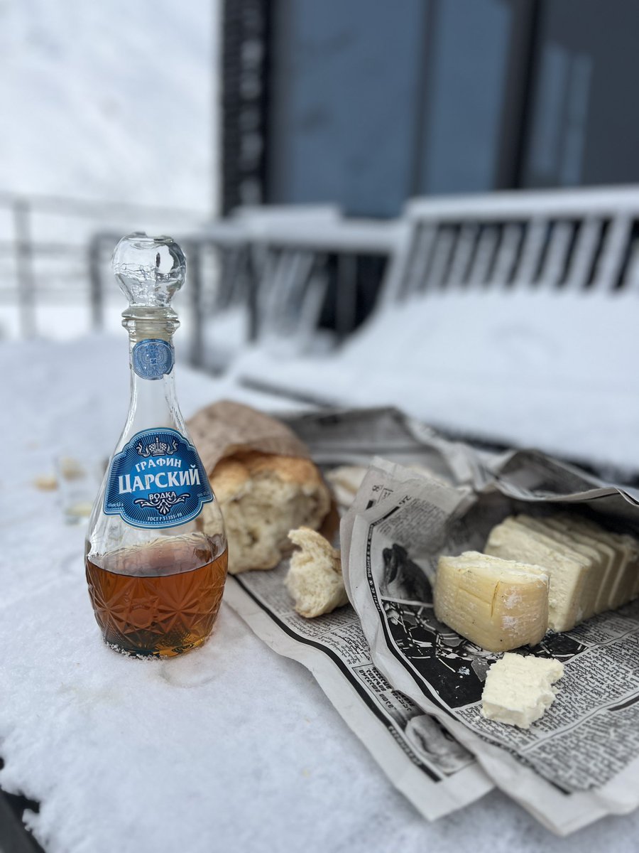 This is why we travel, our @Airbnb host just popped over to clean the snow & invited us to go out and have a morning treat! Homemade Cognac, accompanied by cheese & bread. What a magical moment! A moment that has melted our hearts ♥️ #travel #georgia #airbnb