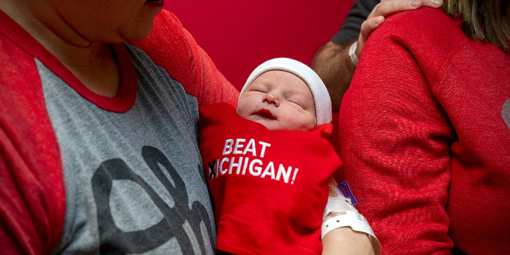 OSUWexMed's tweet photo. The tiniest Buckeye fans in the land are suited up to cheer on @OhioStateFB this weekend 🏈
All babies born at #OSUWex❌ed this week will receive a "Beat ❌ichigan" swaddle in honor of The Ga❌e.
#GoBucks https://t.co/GdGdFltrIn