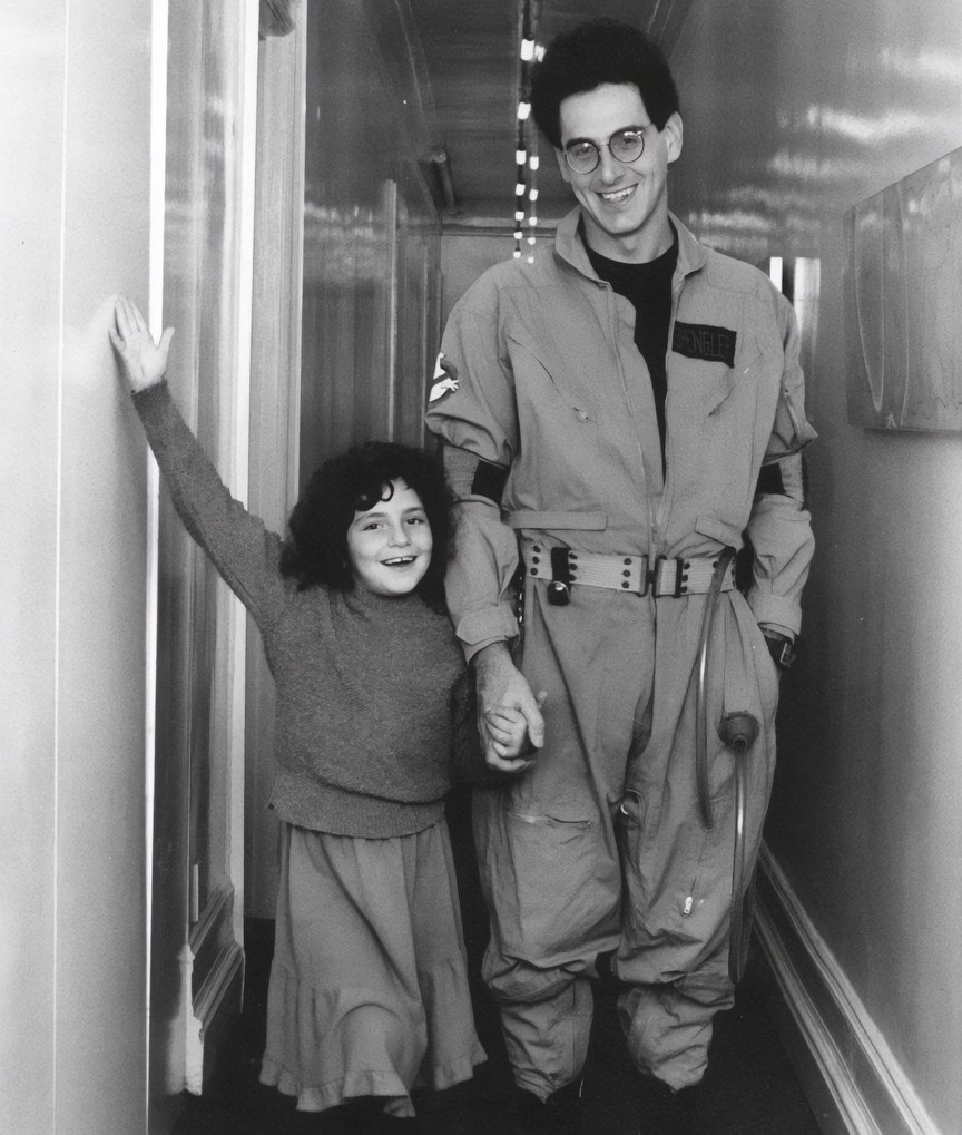 Remembering Harold Ramis on what would've been his 79th birthday.

In this behind-the-scenes photo, Harold is joined by his daughter, Violet, on the set of the original Ghostbusters.