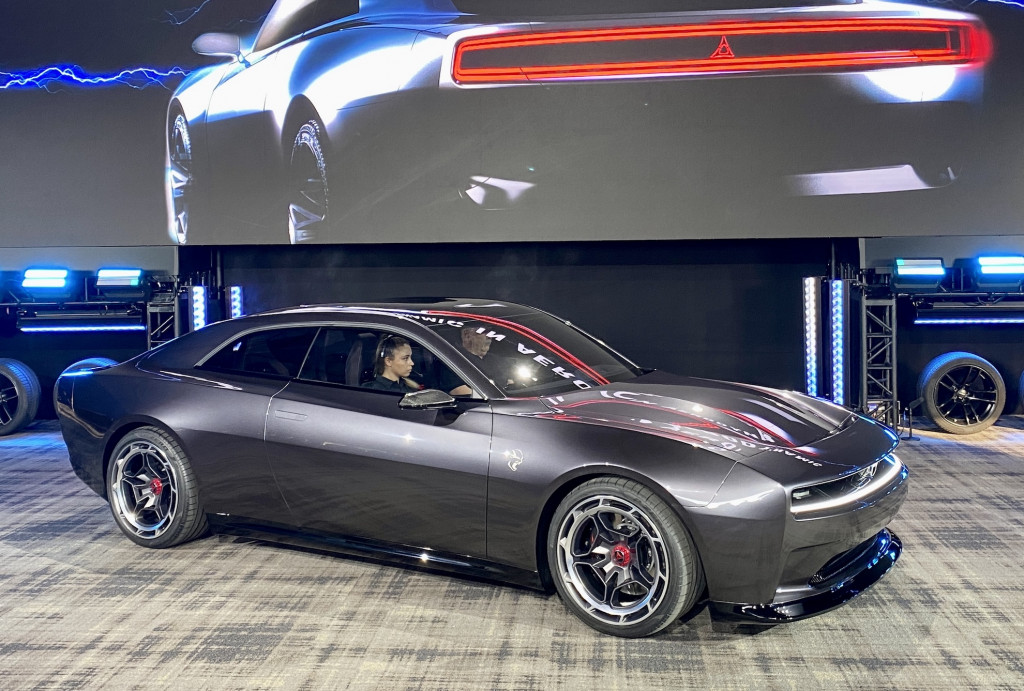 SpokAutoShow's tweet photo. The 2024 Dodge Charger is entering the EV game with a bang. Dodge isn't just making the transition to EV; they are also bringing back the Daytona name. Dodge has found a good balance between the original styling that made the Daytona great while adding a modern/futuristic feel. https://t.co/ZlqVj7LrZe