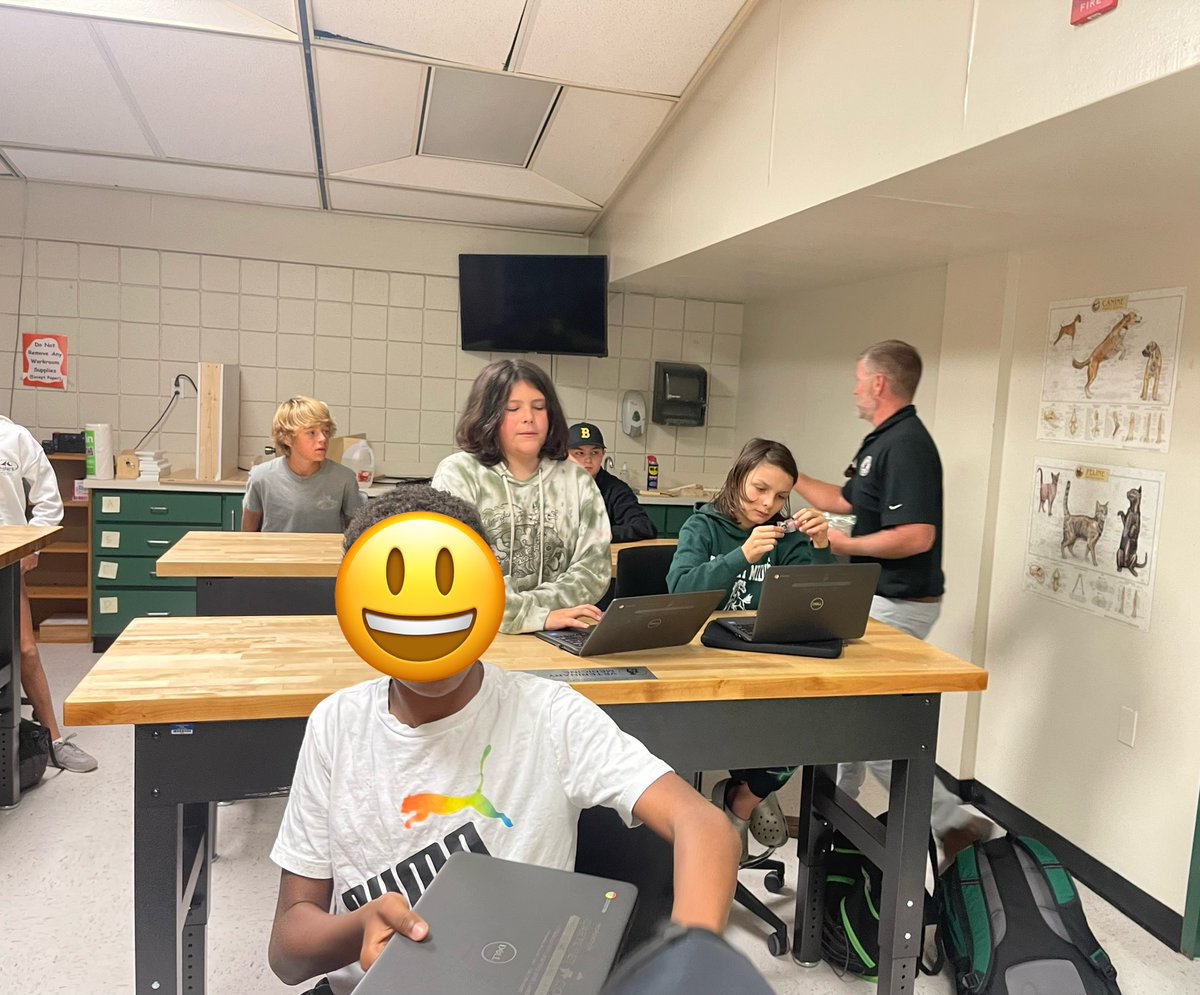 6th grade AIG students created proposals to boost the economy using local legends. Mr. Gene Foxworth discussed the proposal process, how tourism helps the county, and the importance of writing skills in the workforce. He is the Assistant County Manager for Carteret County.