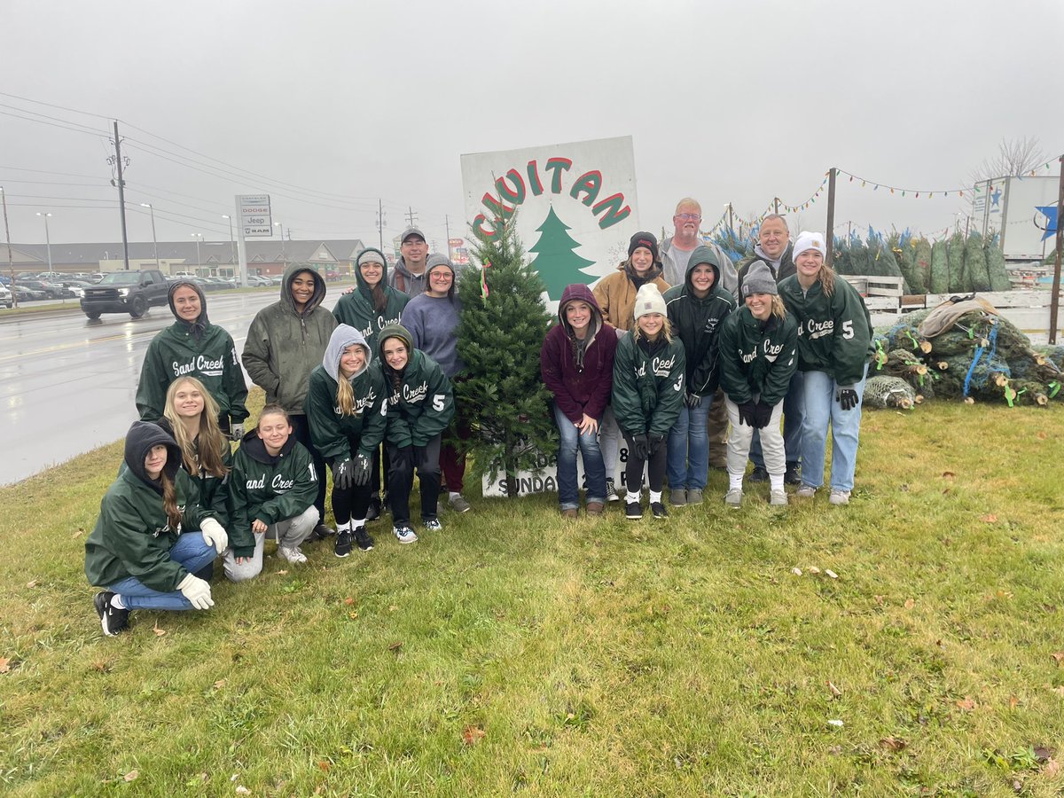 coachwperry's tweet photo. Sand Creek Girls Basketball unloading Christmas trees for Civitan!!! https://t.co/PejHhgwQct