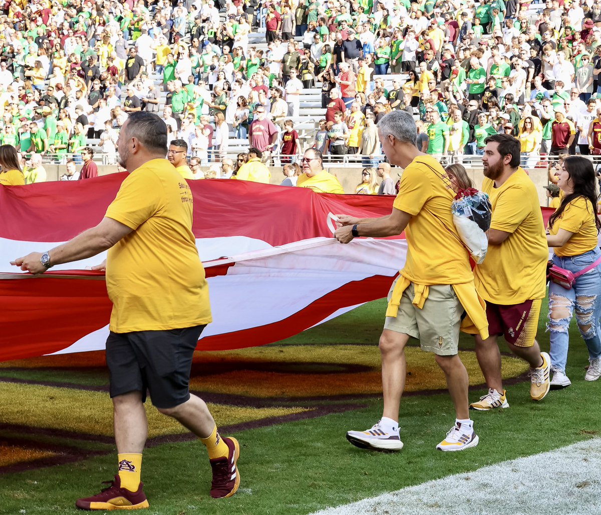 ASUDave's tweet photo. It helps when you’re friends with a professional “on-field” photographer for events like Saturday. Thanks to @asunutgirl for taking these great shots of me along with @SunDevilMatt42 &amp; @KevinEBrooksCPA #GoDevils #SaluteToService #BigFlag https://t.co/2JLYchSo3n