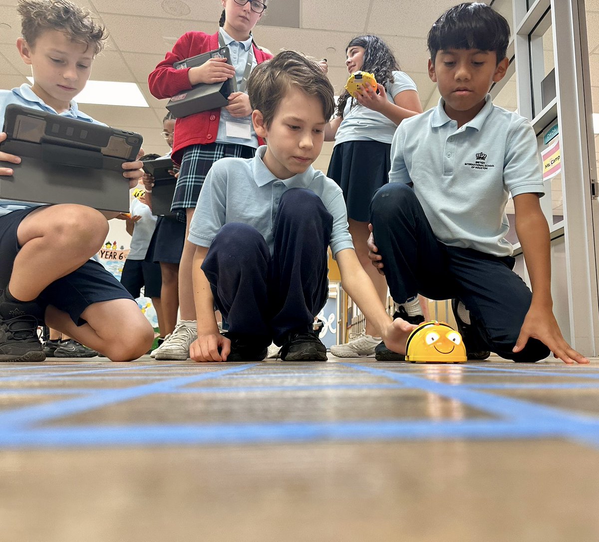 BISHouston's tweet photo. Bringing the learning to life with world-class technology-enabled learning.  Igniting our imagination with #Year6 programming Beebots in maths, investigating position and direction using co-ordinates! #BISHouston #createyourfuture @leswatson82 https://t.co/JUHDK4YfAN