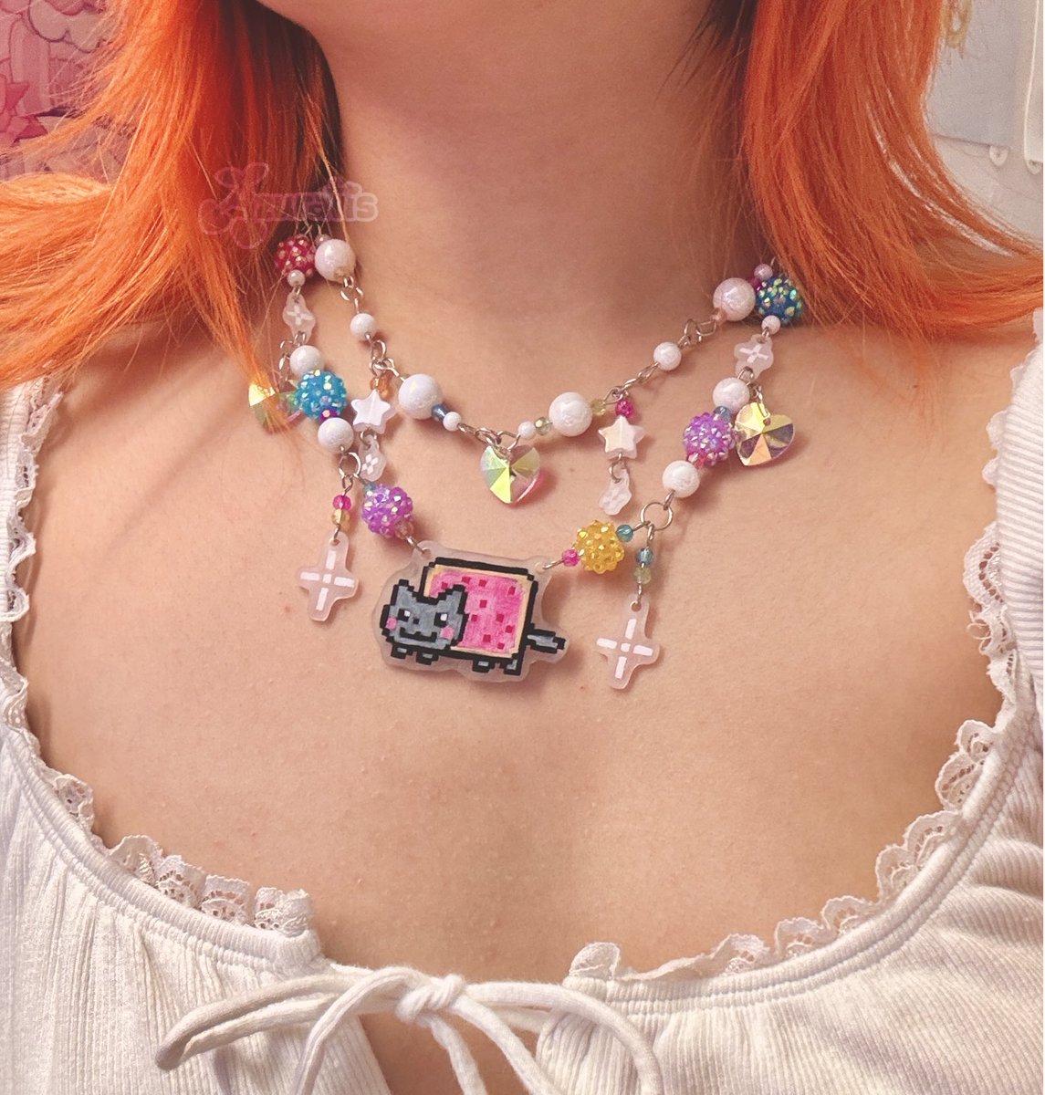 some nyan cat necklaces i made!