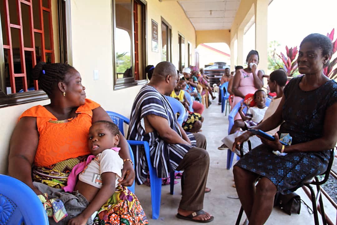 KekeliInc's tweet photo. Kekeli’s Project Manager interacting with families at the Resource Centre as they wait for to see the visiting orthopedic specialist for review. We are one week away from #givingtuesday Watch for more posts about how you can support children with disabilities in Ghana. https://t.co/wFl7cnCzv3