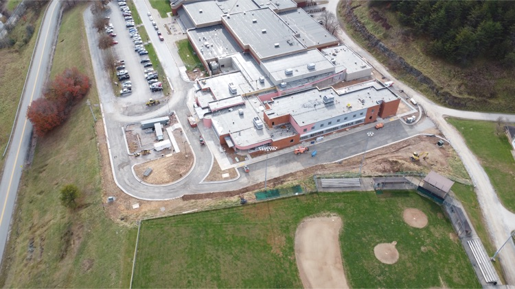 Construction of the new Spencer Middle School is entering the home stretch with its side parking and roadway taking shape in recent weeks. More work will be done over the holiday breaks to bring the expanded bus loop and front parking lot into shape.