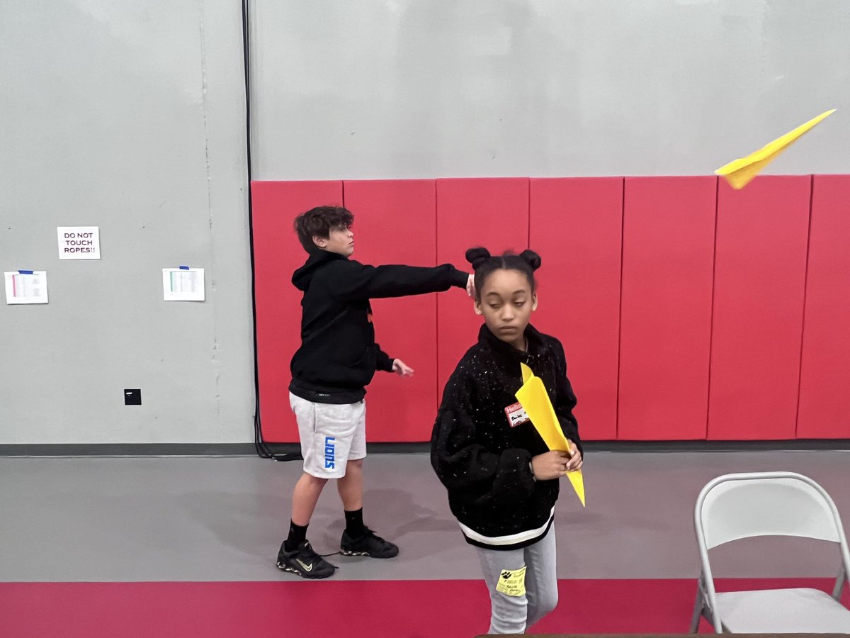 studentofedu's tweet photo. Today CCS STEM hosted a paper airplane contest at WCHS. 4th, 6th and 9th graders flew drones, use a flight simulator & compete. STEM met aviation & had a time. I got to see one of my favorite 4th graders now a senior with his pilot’s license. I’m so proud of him. #ccsstem https://t.co/ZPl54cYfNg