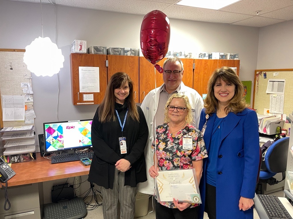 CEO Laura Hennum, VP John Blenkinsopp and Cathy Melero, respiratory therapy manager, surprised Holley with the November safety recognition award.  #SamHealthJobs #BuildingHealthierCommunitiesTogether #SamHealth #BeHealthy
