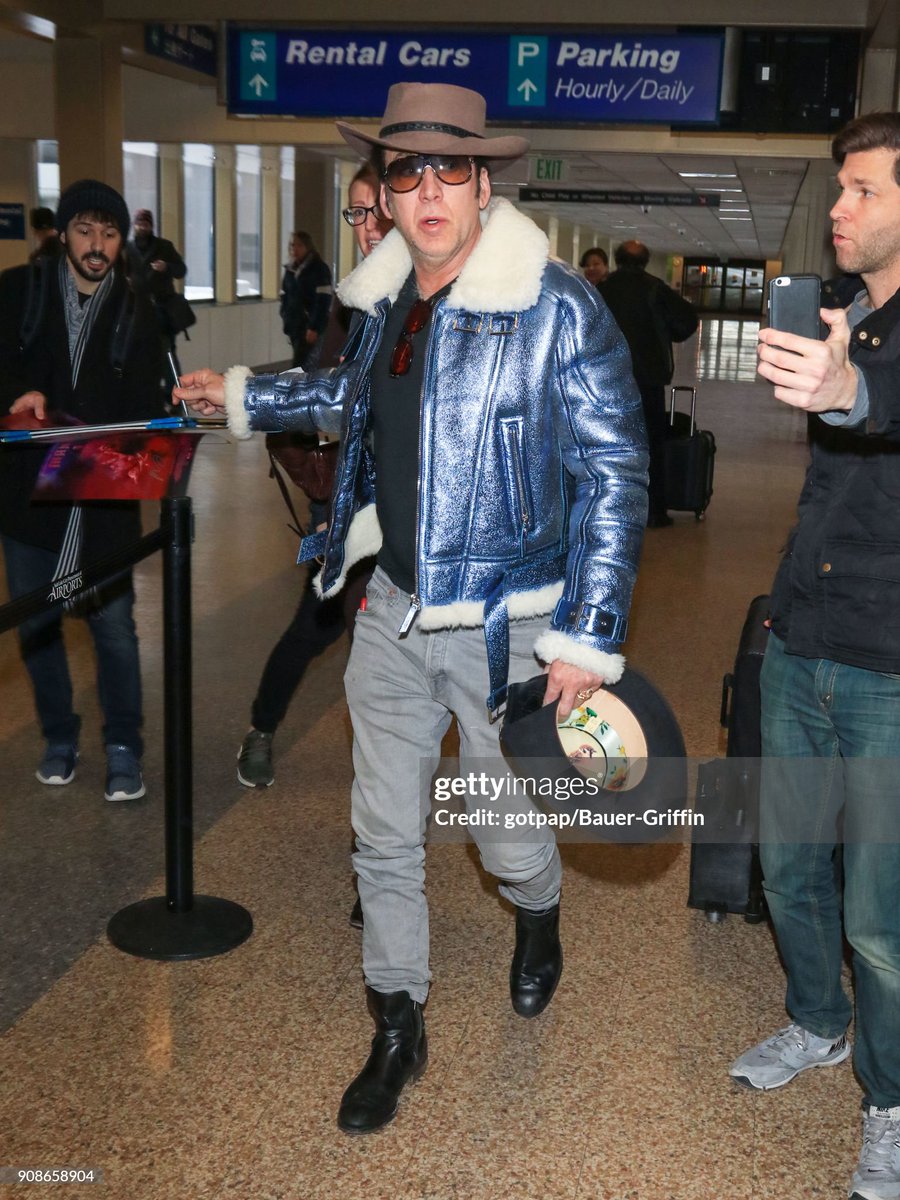 dieworkwear's tweet photo. on the subject of how people dress at the airport, we don't talk enough about Nicolas Cage's insane leather jacket outfits over the years https://t.co/XlDuNS3EUn