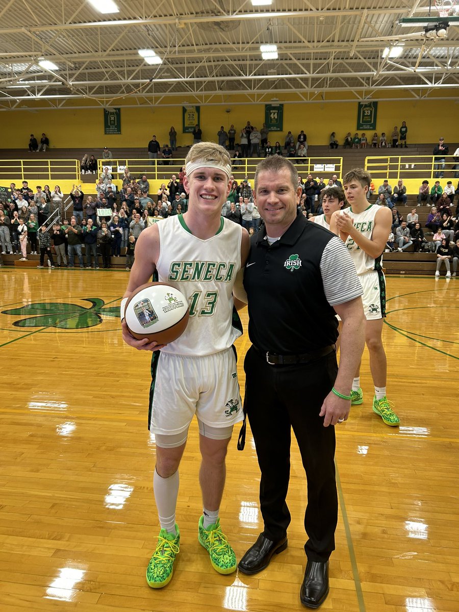 Irish_Athletics's tweet photo. Special night tonight for junior Paxton Giertz. 1000 pts and a proud dad presents him the ball. Congrats Pax! https://t.co/mS2ZpEFnat