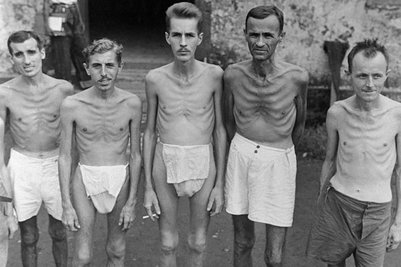phoxpup's tweet photo. @willwheels @foxpup The holocaust was REAL and keeping images of it fresh in our minds is a vital way to make sure we NEVER forget.   The image also accurately represents the charging situation in America...only fleshed out very close to the interstate "bones".  Perhaps he should have used this. https://t.co/9EvTnjnwQy