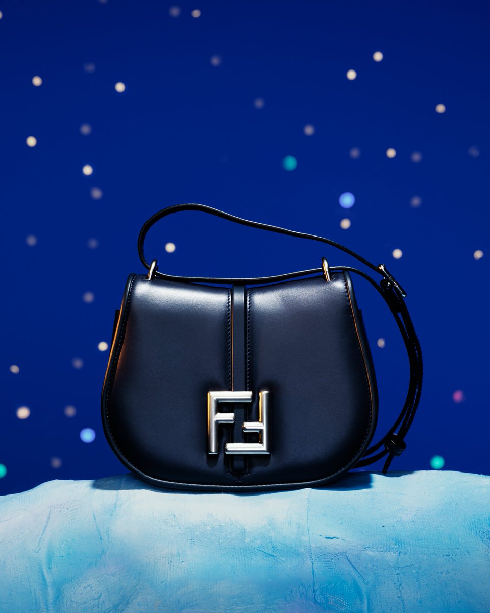 Fendi's tweet photo. A minimalist silhouette meticulously assembled by the Maison’s artisans, the #FendiCmon awaits you in the #FendiGifts selection.
 
Shop styles for everyone on your list in boutiques and at the link https://t.co/Ju1lhrbYkl. https://t.co/BFbRCGZFUa