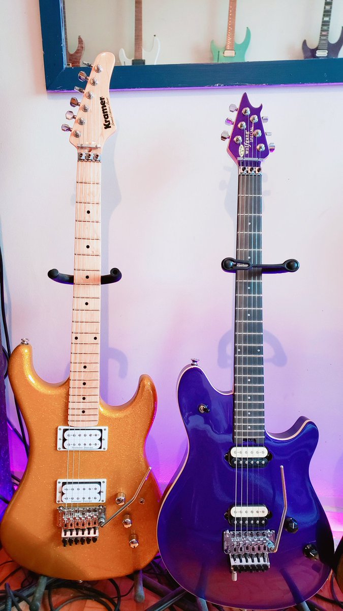 Eddie's  weapons 🎸💛💜. #electricguitar #guitarmania #kramerguitars #kramerpacer #evhwolfgang #evhgear #evhguitars #purpleguitar #yellowguitar #sparklefinish #floydrose #seymourduncan #guitarphotography #guitarpics #guitarphoto #superstrat #stratocaster #eightiesguitar