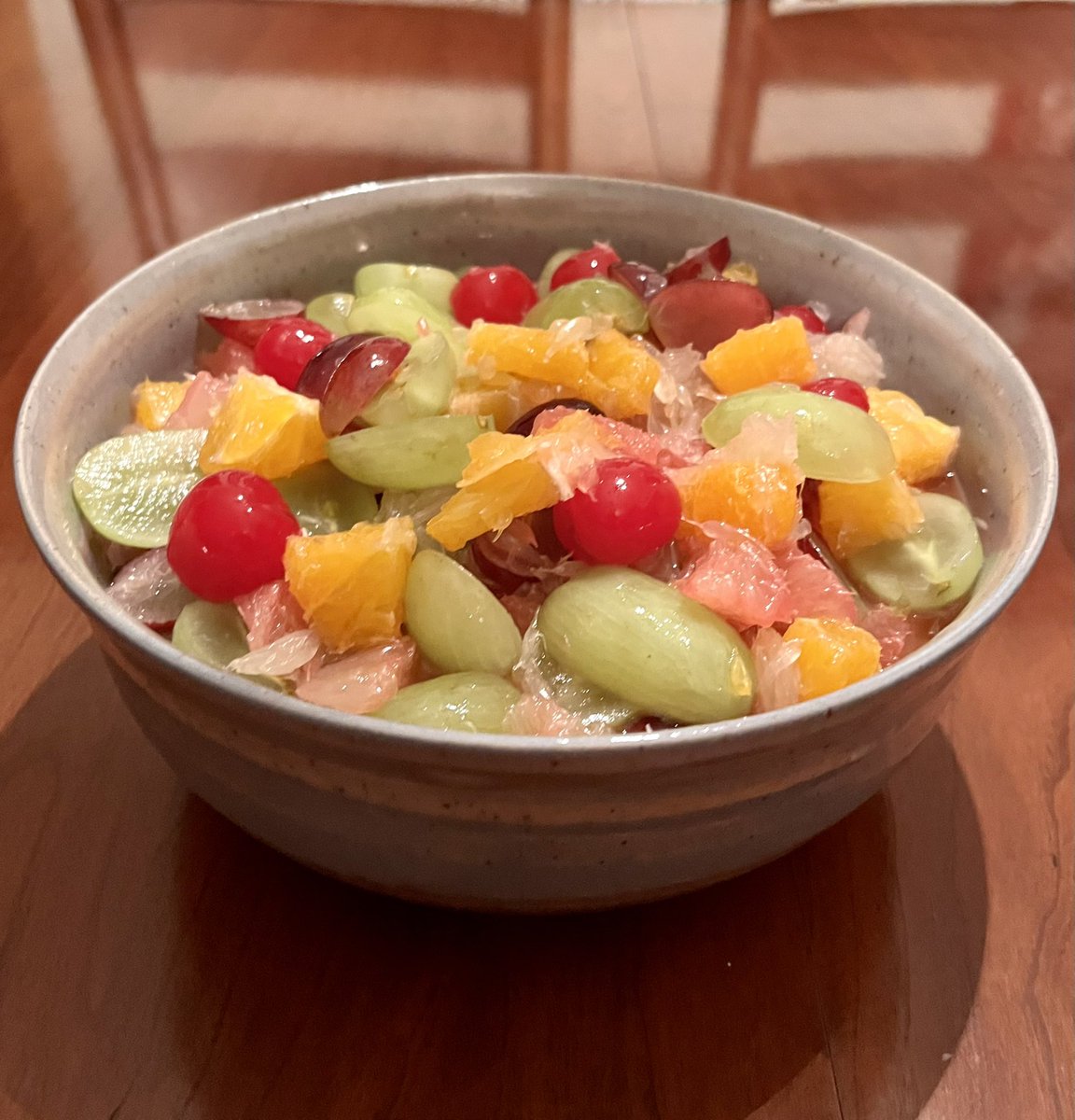 melostrom's tweet photo. Made the pies for tomorrow, including this apple crostata, &amp; got the fruit salad out of the way. This is really my grandma’s salad: red &amp; white grapefruit, oranges, green &amp; red grapes, &amp; maraschino cherries—a refreshing combination. You should try it! Mocha &amp; I ❤️ Thanksgiving!🍁 https://t.co/0XqgPD8izl