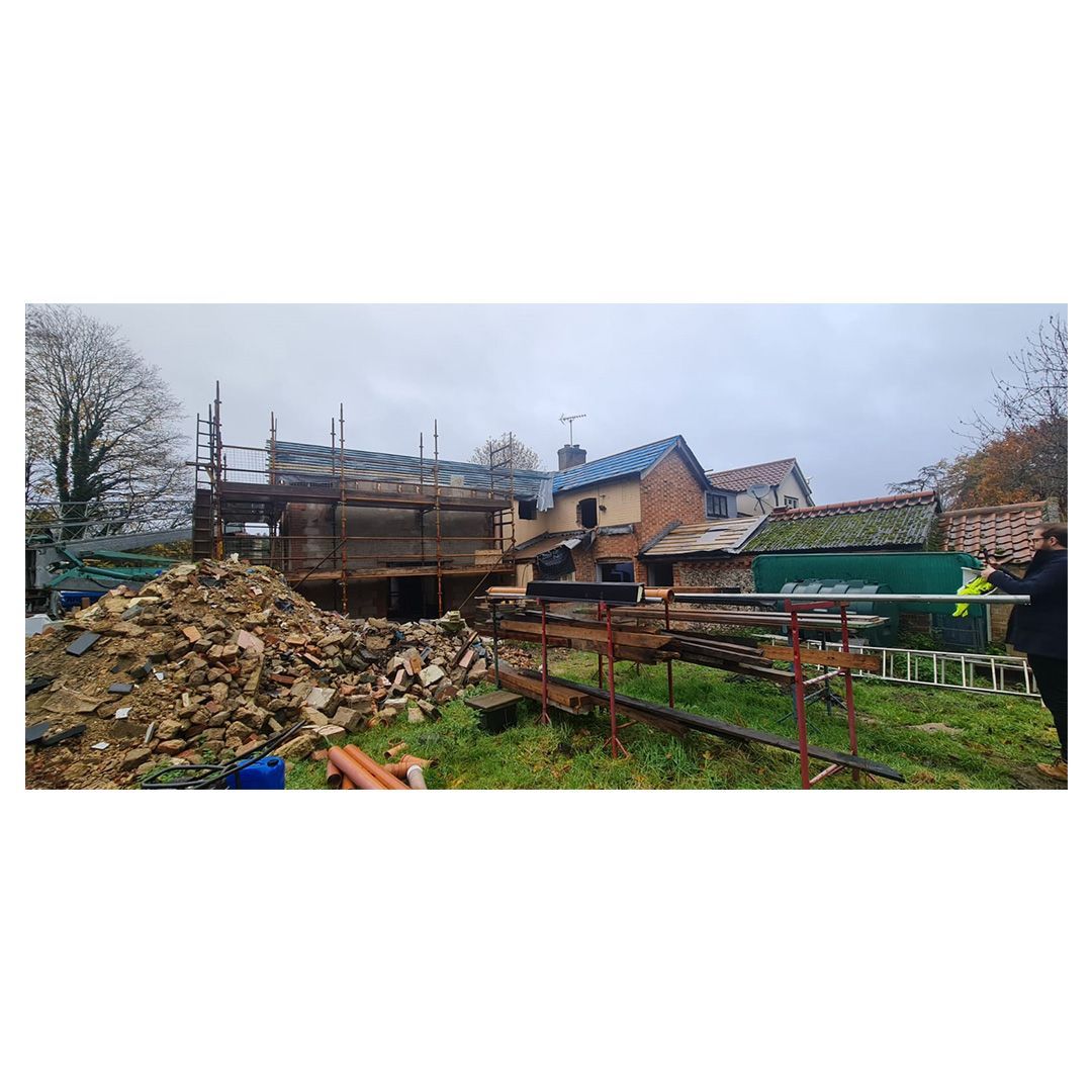 CC_Architects's tweet photo. A  wet and muddy site visit to see how things are progressing with our Thorpe Woodlands Adventure Centre project. The main roof is on, and the flint blocks are starting to be laid. The project will provide high-quality staff accommodation, to enhance and transform staff welfare https://t.co/zrCl5kUjp8