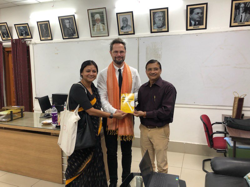 globalineq's tweet photo. A copy of Talking About Global Inequality handed over to head of department of political science at Banaras Hindu University by two of its editors https://t.co/HgTFrHY5CZ